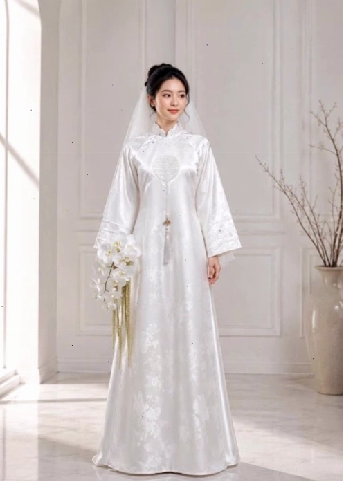 Áo dài cưới màu trắng trơn với điểm nhấn ngọc trai tinh tế