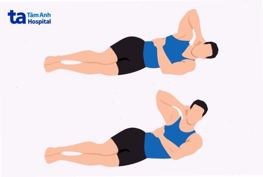Gập bụng nghiêng người khi đứng giúp làm săn chắc vùng eo hai bên.