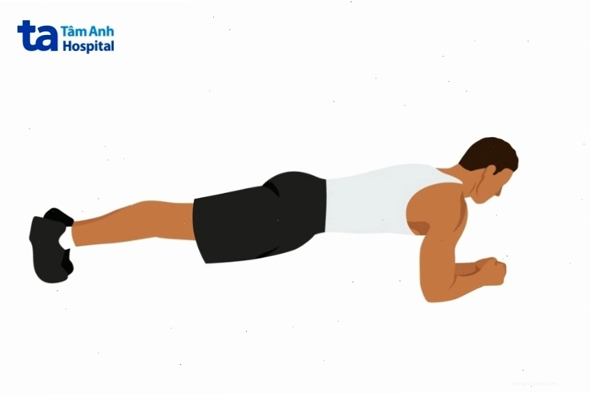 Người phụ nữ thực hiện bài tập plank cơ bản