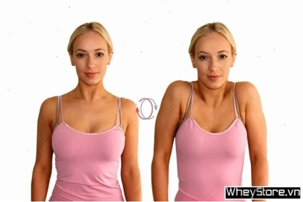 Người phụ nữ thực hiện bài tập xoay vai tròn (Shoulder Roll)
