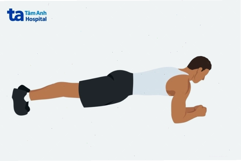 Người tập bài tập plank cơ bản giữ cơ thể thẳng hàng