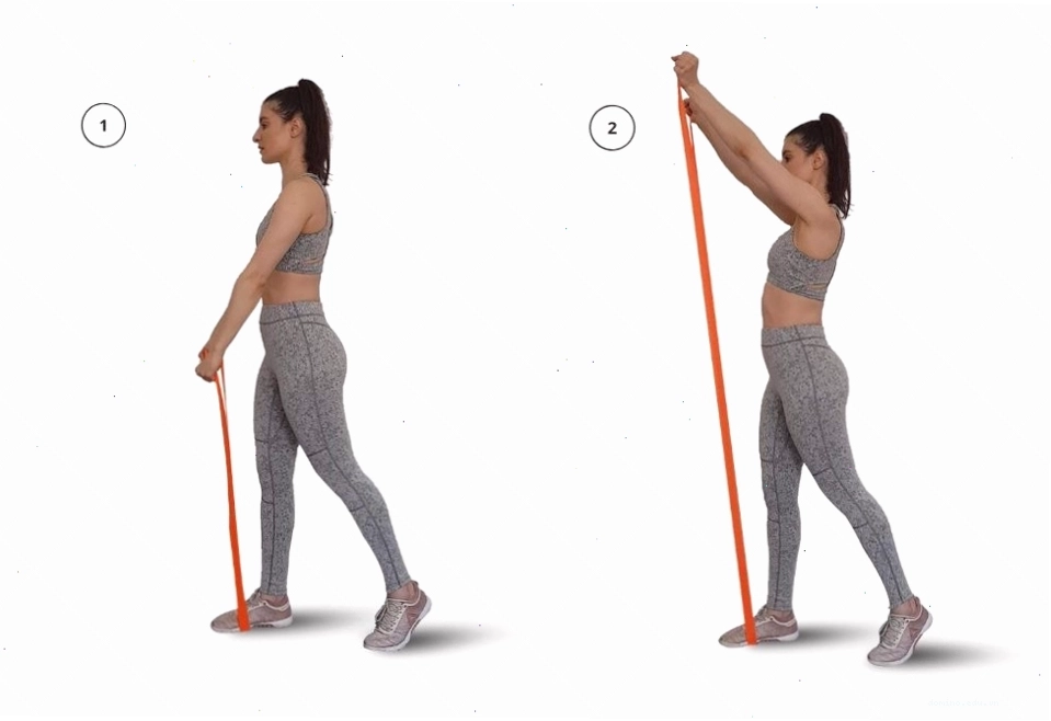 Người tập thực hiện bài Shoulder Press với dây kháng lực