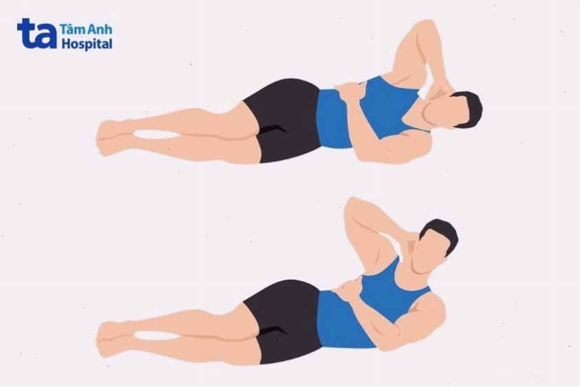 Người tập thực hiện động tác gập bụng nghiêng (side crunch)