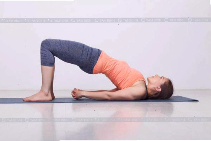 Tư thế cây cầu chữa đau thắt lưng